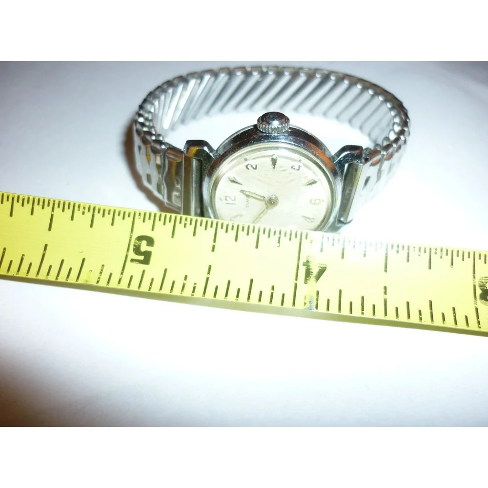 Vintage Timex Womens Silver Tone Round Face Watch Stainless Expansion Band